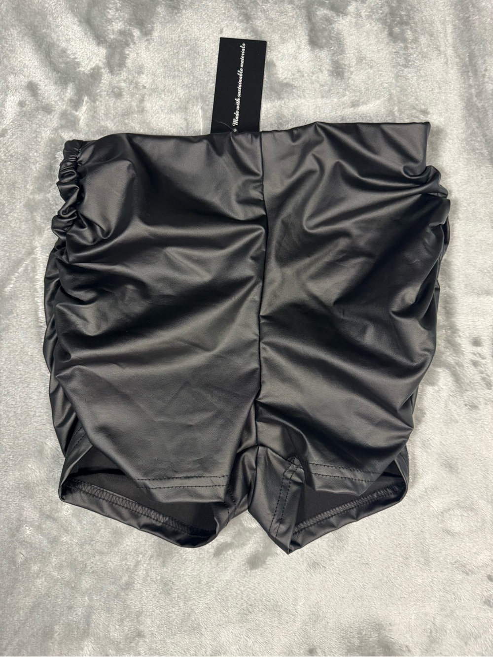 Faux leather shorts with side scrunch